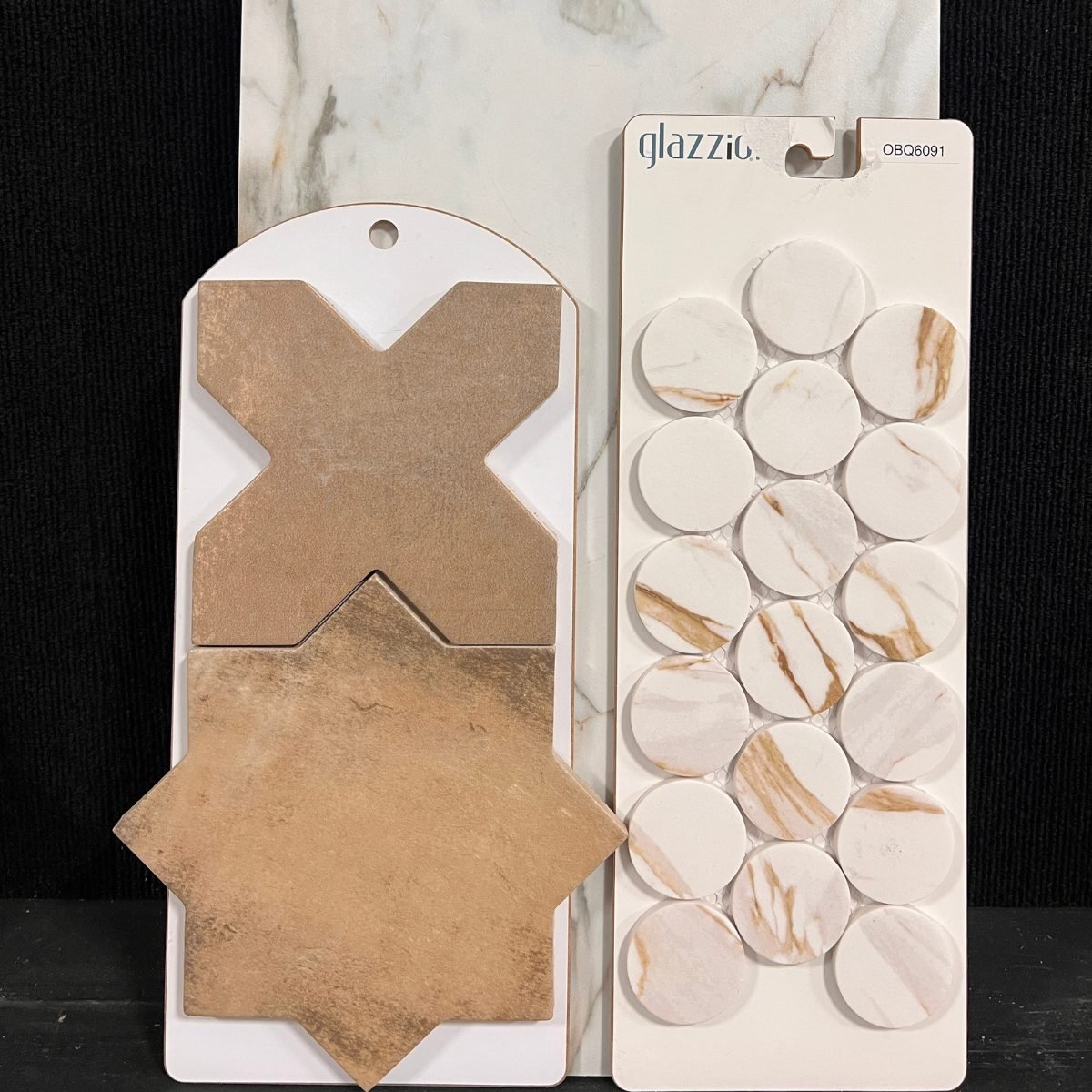 Star and cross accent tile with round mosaic tile at Kentucky Tile Distributors in Owensboro KY