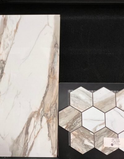 White marble look porcelain tile with hexagon mosaic at Kentucky Tile Distributors in Owensboro KY