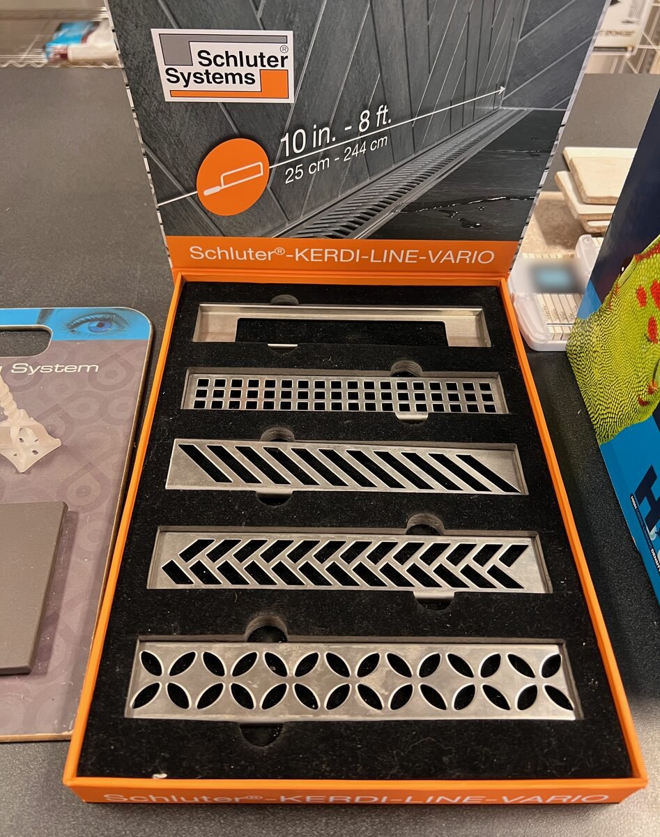 Schluter Kerdi-Line linear shower drain covers on display at Kentucky Tile Distributors in Owensboro, KY